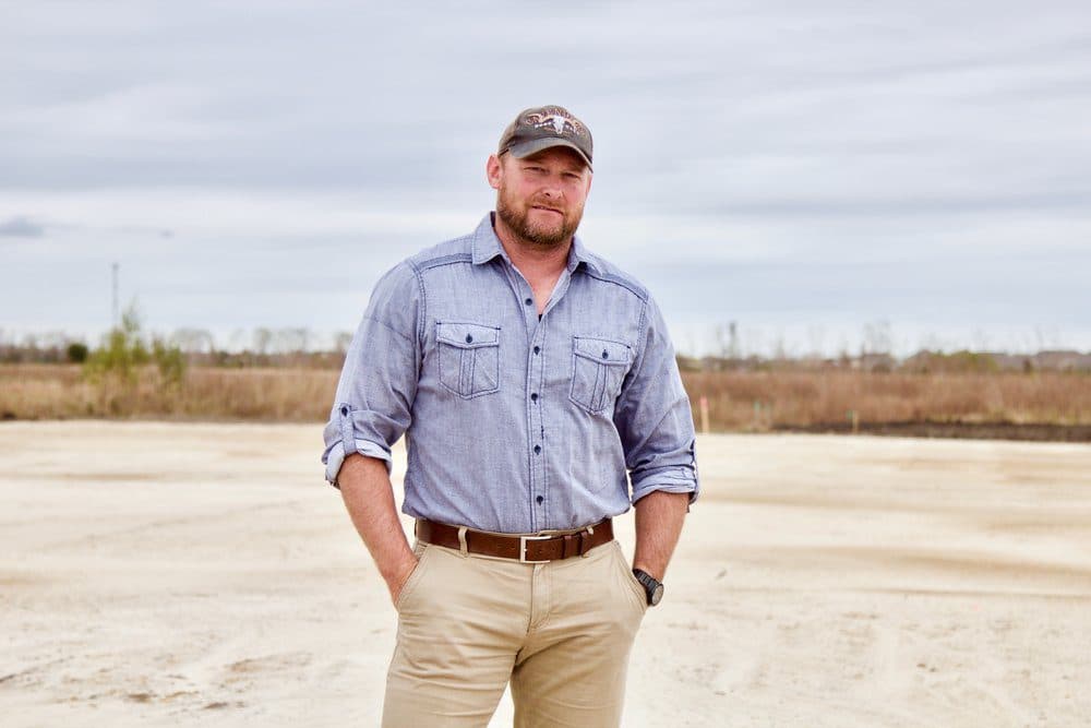 Kenny King, Chief Operating Officer of K.G.W. Corporation, on a graded site